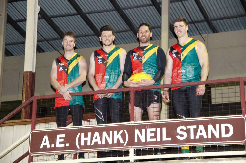 HISTORIC: Jesse Eckel, Naish McRoberts, Damian Joiner and Cody Driscoll model the jumpers that will be worn this weekend. Picture: LACHLAN WILLIAMS
