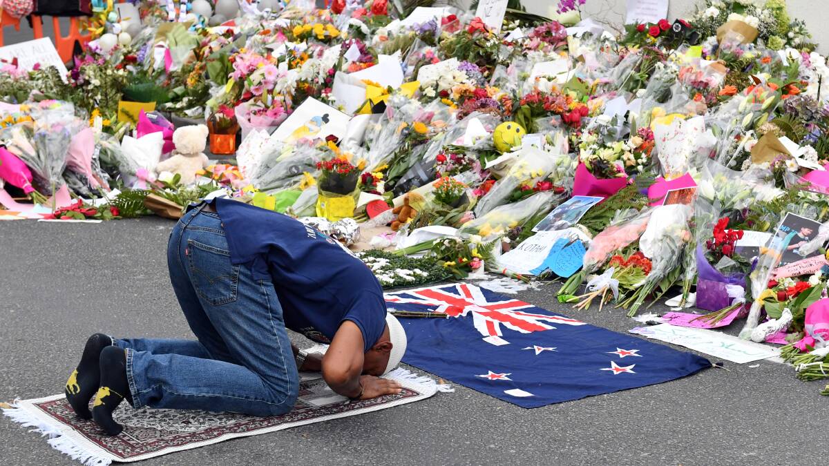 HUMANITY: We should stand with New Zealanders and Muslims in this time of misery. Picture: AAP Image/Mick Tsikas