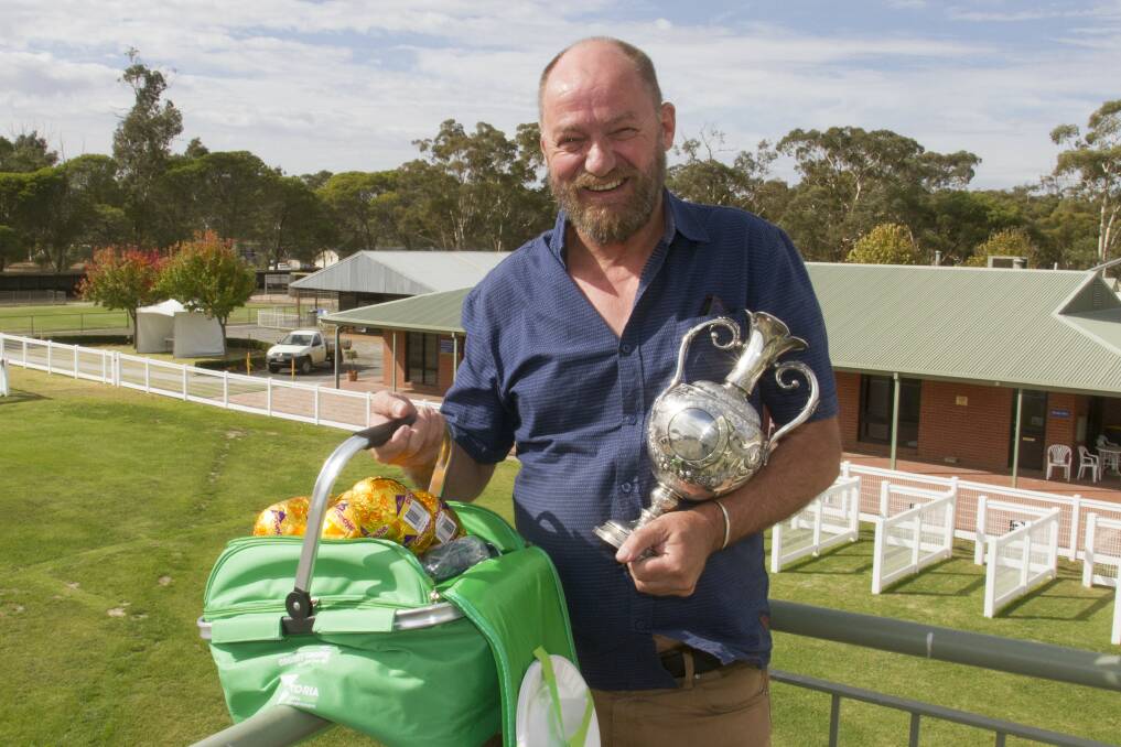 Stawell Racing Club's Mark Percival with the Pleasant Creek cup. Picture: PETER PICKERING.