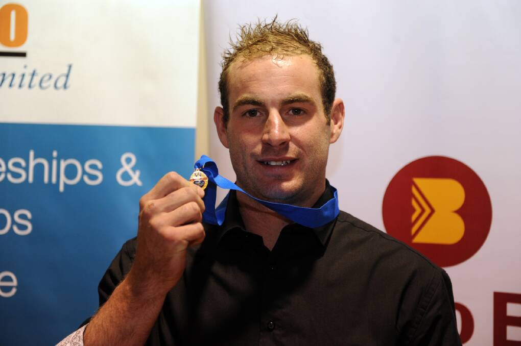 Justin Chilver celebrates his 2013 Toohey Medal win. 
