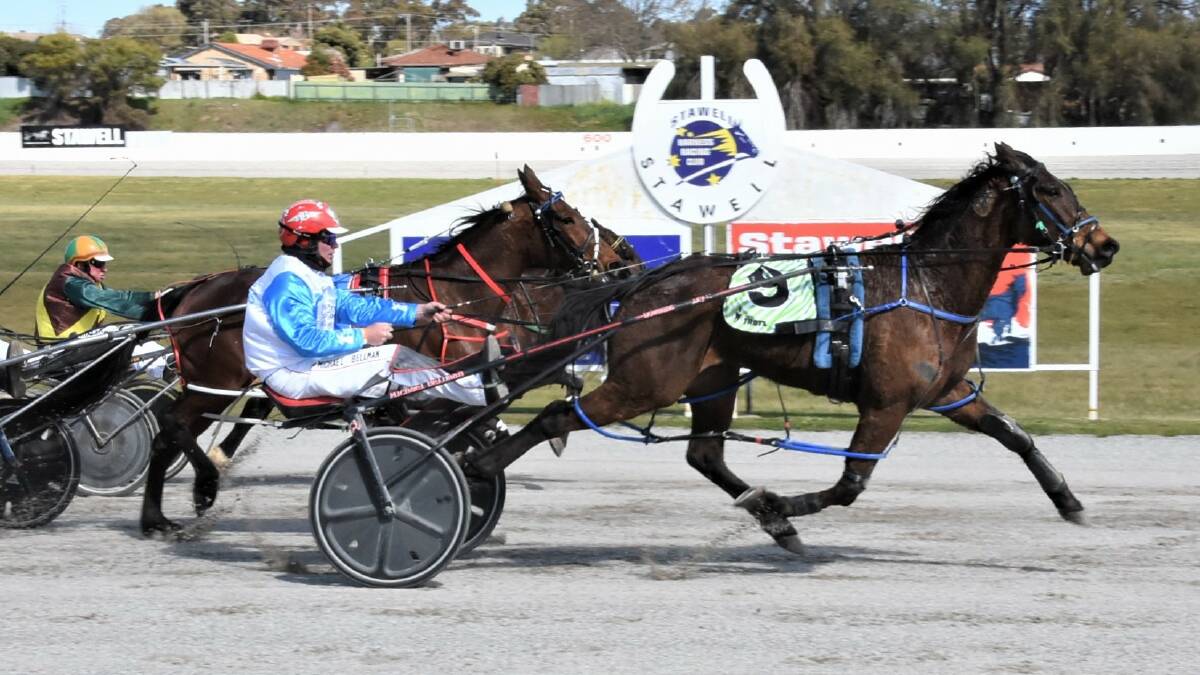 FOR A CAUSE: Ararat reinsman Michael Bellman sports the blue & white Prostate Cancer Foundation silks and gets Aerodyne Guy home a winner for local owner Les McLeod and trainer Owen Martin at Stawell's recent Father's Day meeting. Picture: CLAIRE WESTON PHOTOGRAPHY