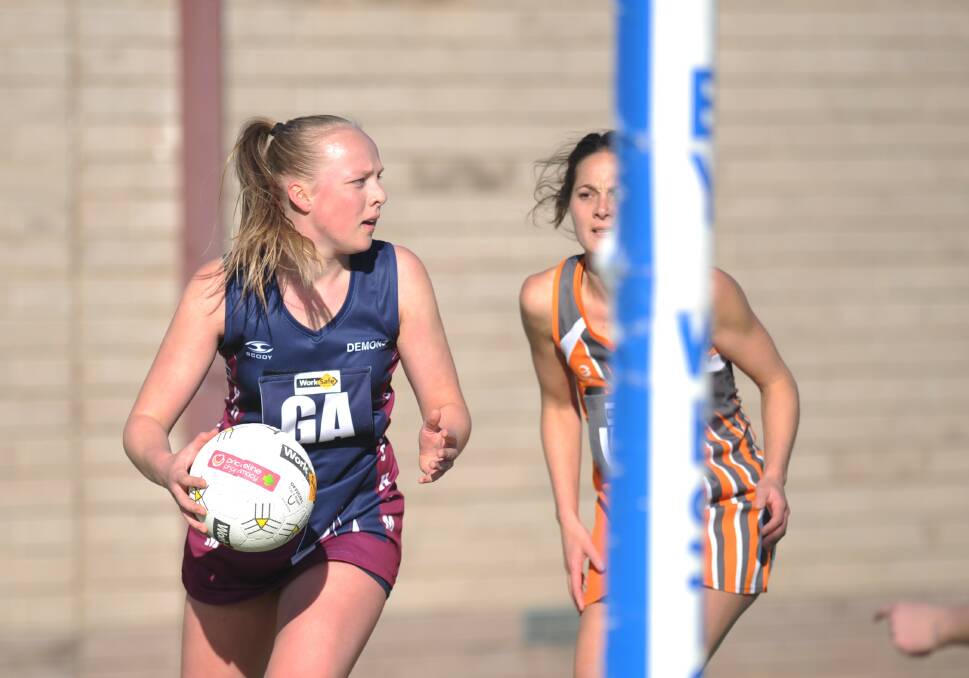 Emma Buwalda looks for a pass against the Giants earlier this season. Picture: MATT CURRILL