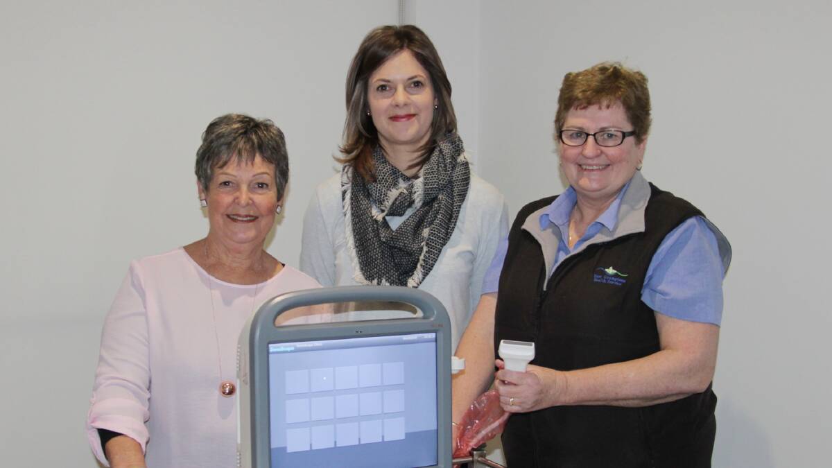 BOOST: Auxiliary president Viv Burridge, treasurer Christine Van Straaten and physiotherapist Caroline Hamilton with the machine that will enable clients to have visual feedback about the working of their pelvic floor muscles. 