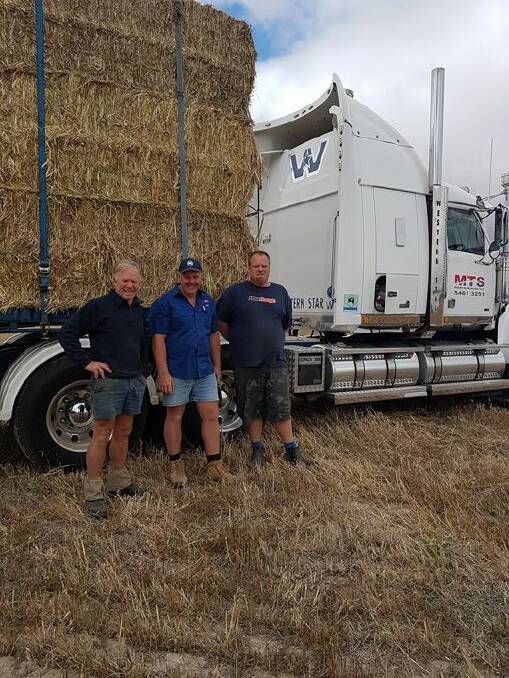 HAY RUN: Chris Bibby from Navarre, Troy Hendy from St Arnaud and Todd Binks from Maryborough supporting this year's Burrumbuttock Hay Run. 