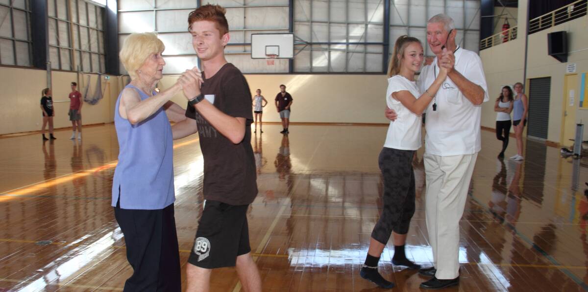 PASSIONATE: Sheila and Neil Thornton instruct Nick Bendall and Chantelle Barber through the ballroom dances. Picture: Peter Pickering