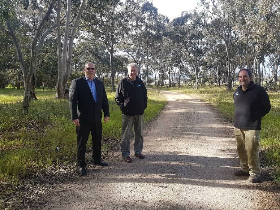 PLANS TO OPEN: StawellBiz president Nigel Keating, Cr Murray Emerson and Peter Carey are hoping to open the Grampians Rail Trail, with the help of concerned community members. Picture: Anthony Piovesan 