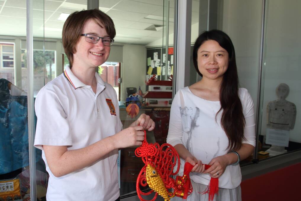 CHINA BOUND: Star student Melissa Sanders with proud teacher Ling Zhao. Picture: Peter Pickering.