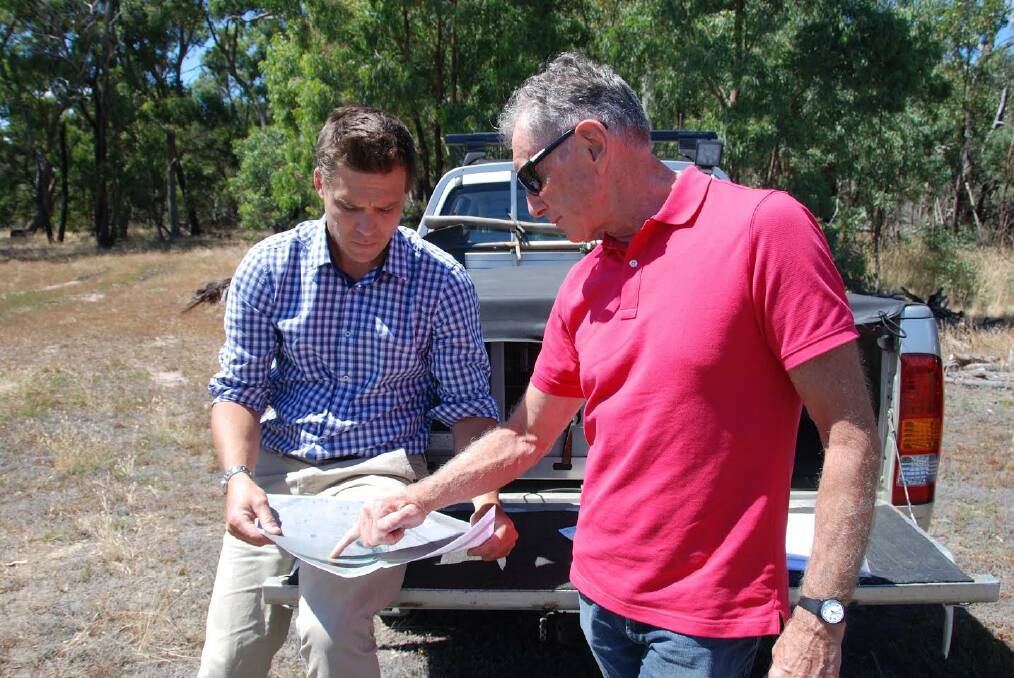 FAUNA: project board members Mike Stevens and John Hawkins discuss the predator proof fence plans for the site. 