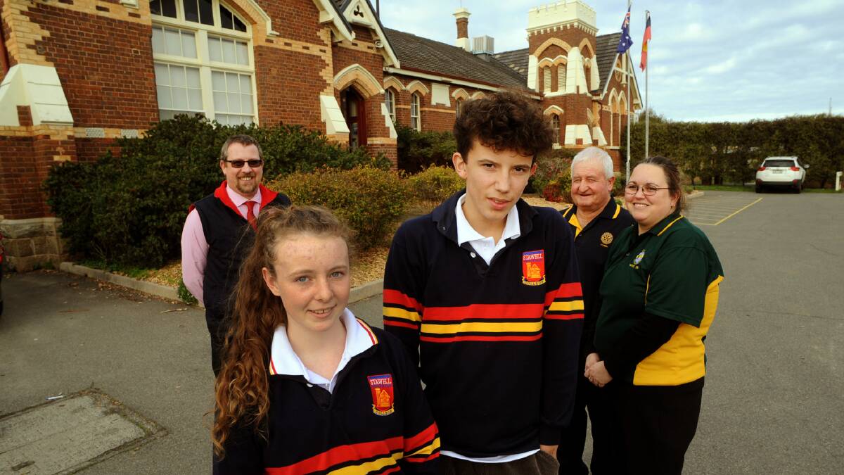New Zealand exchange students at Stawell Secondary College Brie Davidson and Jack Hartley, teacher Aaron Dalziel, Rotary's Des Pickford and Kimberley Gehan. Picture: PAUL CARACHER