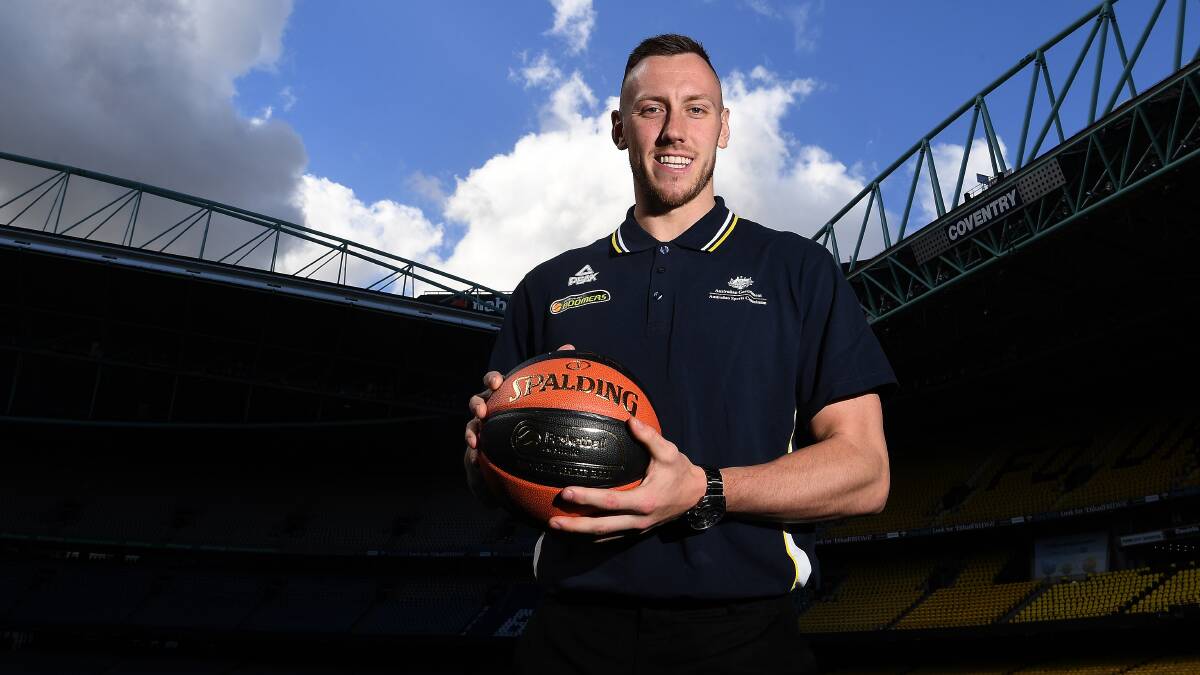 Australian basketballer Mitch Creek poses for a photograph at Etihad Stadium in Melbourne in August before heading to America. Picture: AAP IMAGE/JULIAN SMITH