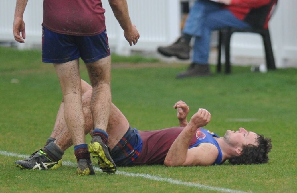 Horsham star Rhona Conboy finds himself flat on the turf on a cold and difficult day against the Horsham Saints in round 10. Conboy hasn't played since round 12. Picture: RICHARD CRABTREE