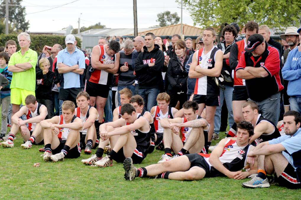 The Saints dejected after defeat in the 2012 grand final. 