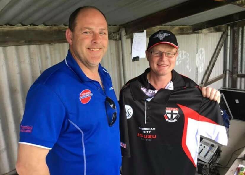 David Johns and Horsham Saints president Nathan Martin. Picture: CONTRIBUTED