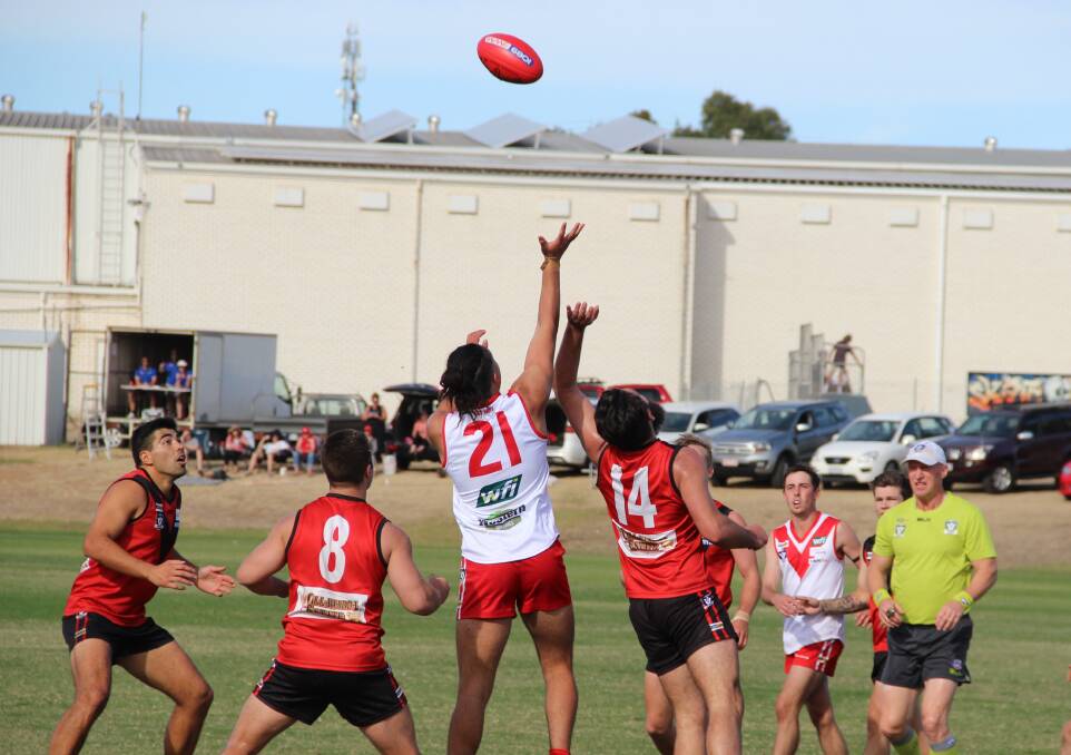OPTIONS: Ararat and the Stawell Warriors battle in the 2019 Good Friday match.