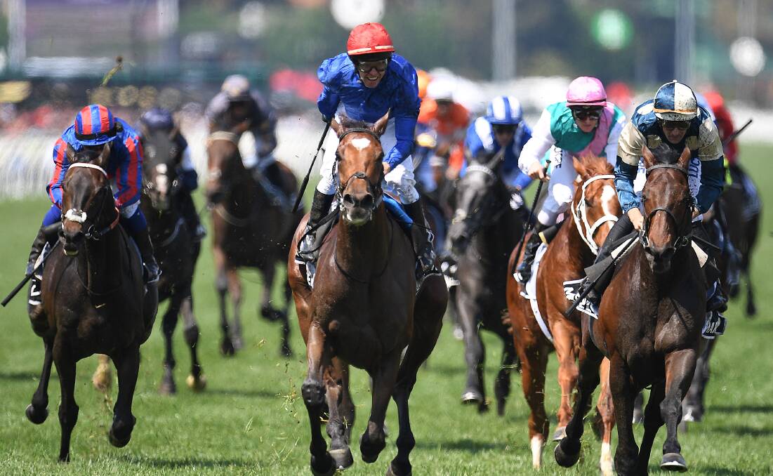 Kerrin McEvoy rides Cross Counter to victory in the Melbourne Cup. Apsley's Tom Porter had a stake in Red Cardinal. Picture: AAP IMAGE