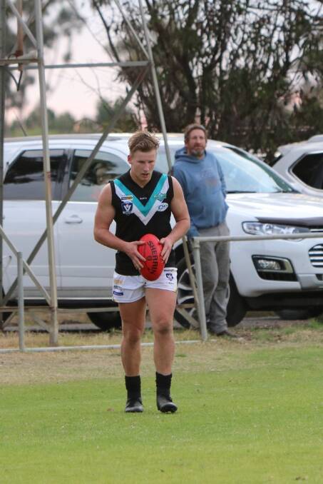Swifts player Josh Davis with the ball against Kalkee last round. Picture: TRISH RALPH