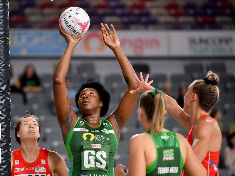 Jhaniele Fowler (c) netted 62 goals for the Fever in their 71-66 Super Netball win over the Giants.