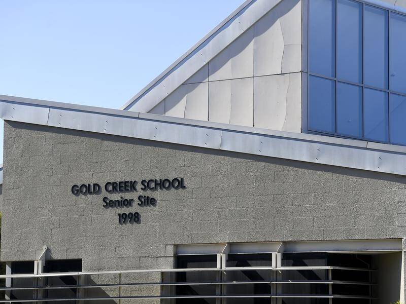 Urgent genomic testing is under way after a Gold Creek School student tested positive to COVID-19.