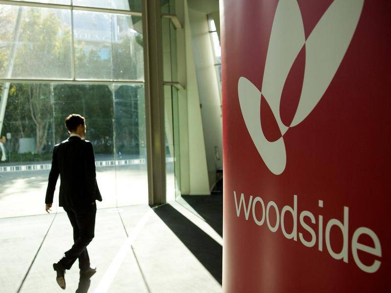 Woodside Energy is being urged to re-evaluate the investment case for its new gas projects. (Richard Wainwright/AAP PHOTOS)