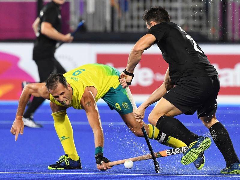 Mark Knowles bowed out of hockey a winner as Australia beat NZ in the Commonwealth Games final.