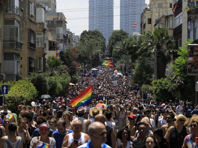 Participants in the gay pride parade moved through downtown Tel Aviv before reaching the beach.