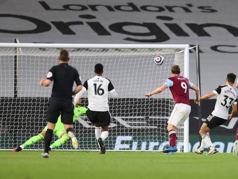 New Zealand international Chris Wood scores Burnley's second goal in their win at Fulham.