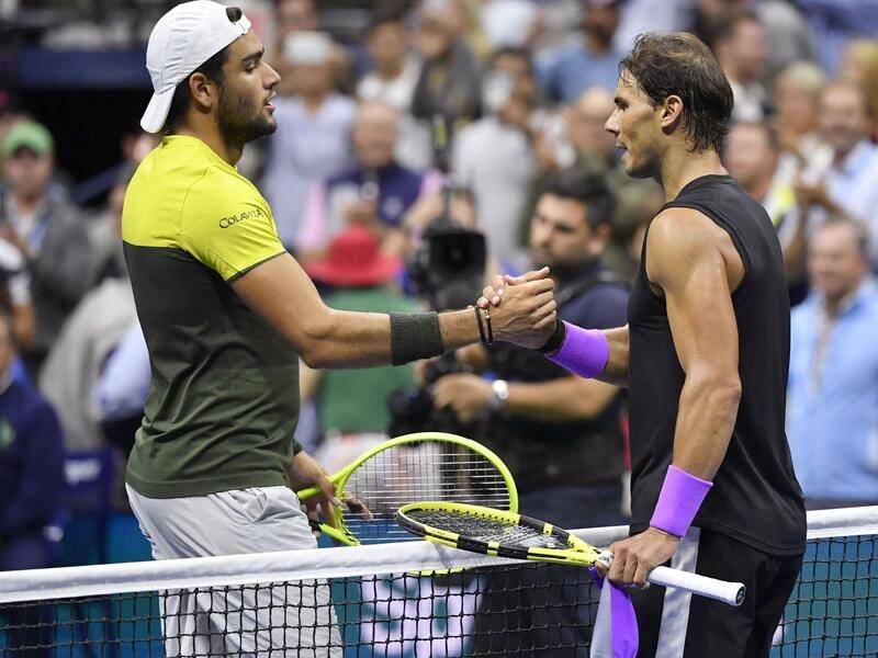 Matteo Berrettini (left) has come a long way since his only meeting with Rafael Nadal in 2019.
