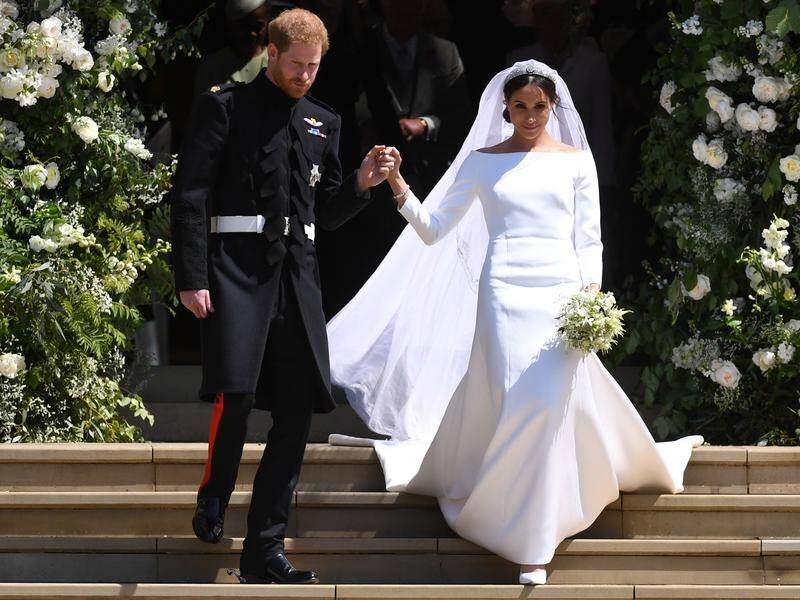 The Duchess of Sussex's wedding dress has won praise for its simple elegance.