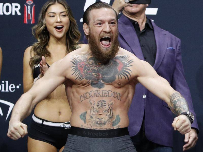 Conor McGregor poses during the weigh-in for the UFC 246 in Las Vegas.