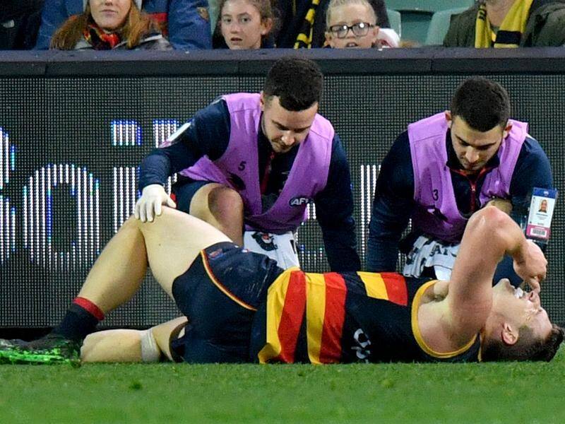 Josh Jenkins was crocked in the final minutes of the Crows' 33-point win against Richmond.