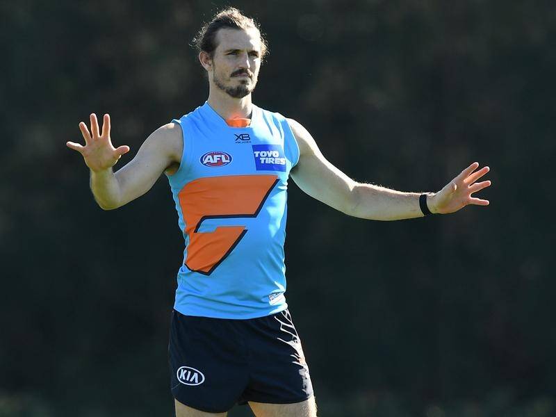 GWS co-captain Phil Davis returns to face Port after missing the 47-point win over Collingwood.