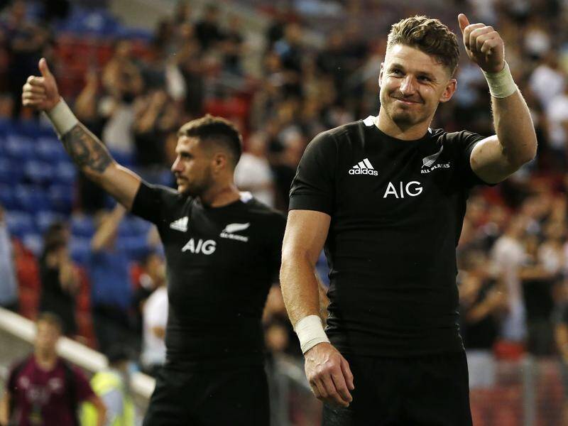 Beauden Barrett celebrates with fans after NZ ended their Test season with a big win over Argentina.