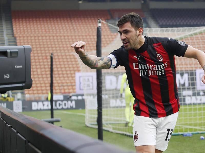 Alessio Romagnoli hails a goal for the cameras in Serie A leaders Milan's 2-0 win over Fiorentina.