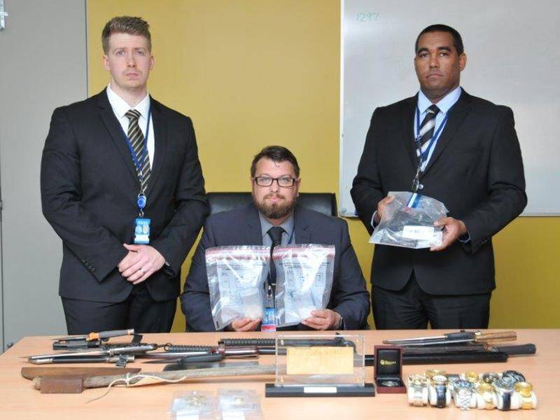 Seventeen people have been charged after weapons and drugs were seized in police raids in WA.