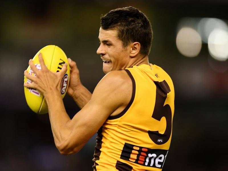 Former Hawk Ryan Burton took a little time to get used to the fact he'd be traded to Port Adelaide.