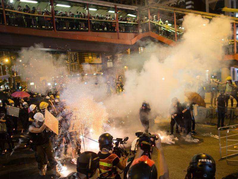 Chinese media says Hong Kong business leaders are demanding an end to the violence.