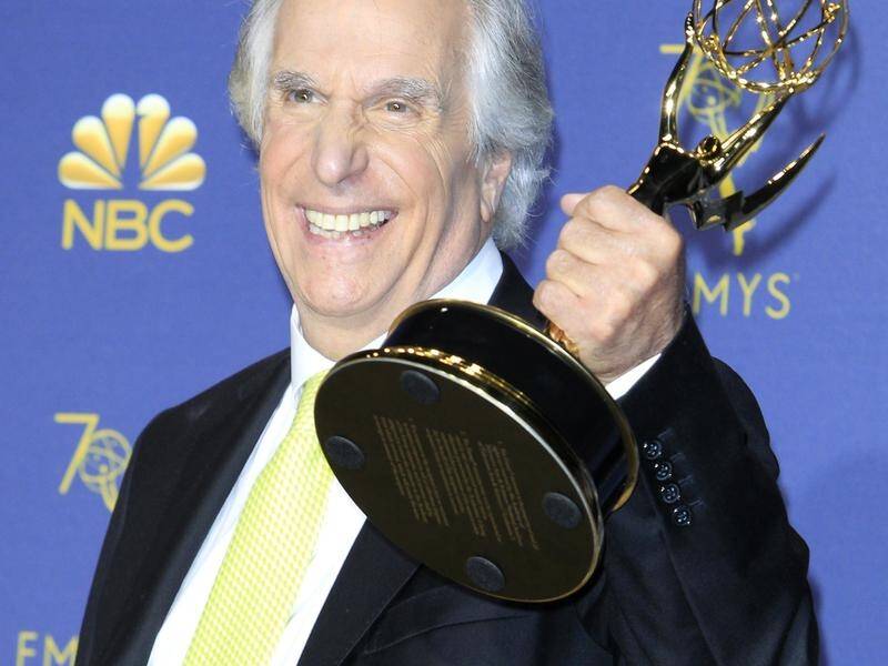 Henry Winkler holds the Emmy for Outstanding Supporting Actor in a Comedy Series for Barry.