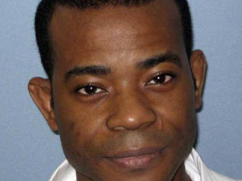 Nathaniel Woods was convicted in 2005 for his role in the fatal shootings of three police officers.