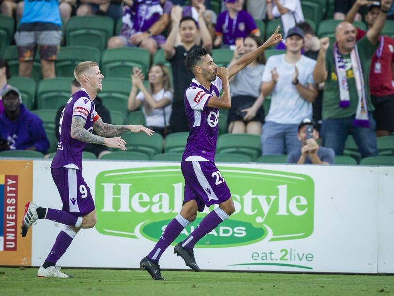 Perth Glory's Juande (R) scored the winner against Western Sydney after a soft penalty decision.