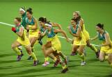 Celebration time: the Hockeyroos jubilant after Madonna Blyth scores the winning goal. Photo: Getty Images