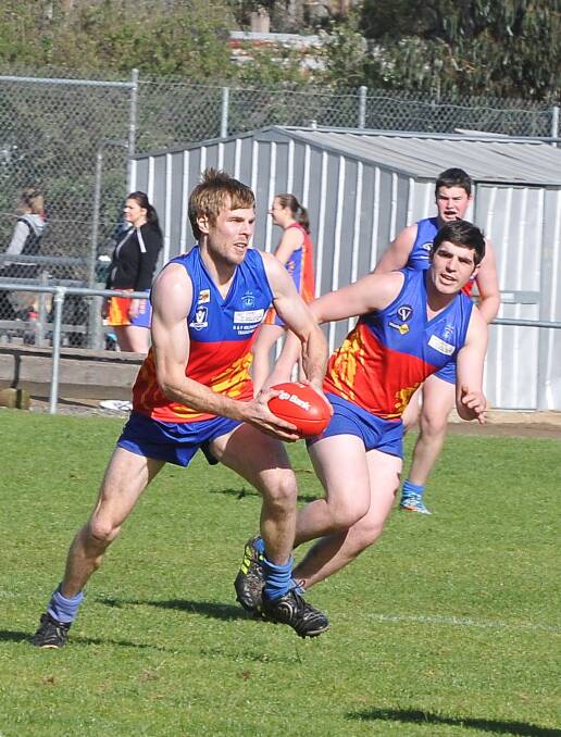 Danny Grellet looks to get a kick away in front of team mate Isaac Debono in their two point loss to Penhurst