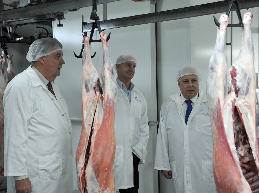 State Treasurer Tim Pallas (right) takes a tour of the abattoir with general manager Greg Nicholls and Northern Grampians Shire Mayor, Cr Murray Emerson.