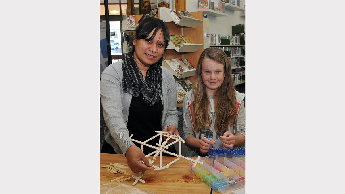 Sepe Illig assists Melanie with her creation at the Stawell Library.