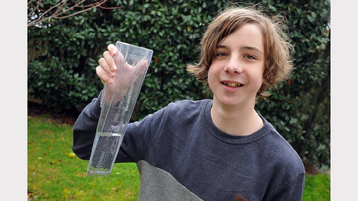 Ben Rethus checks the rain gauge during his interesting week of work experience at the Stawell Times News.