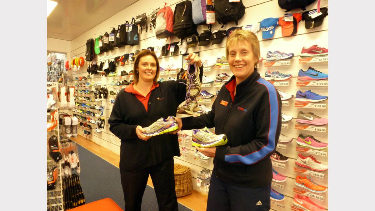 Kate Toomey from Stawell Regional Health with an old pair of sneakers and Robyn Young from Stawell Sportspower with the new Saucony runners up for grabs.