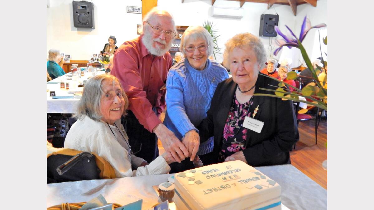Foundation members Margot and Ken Woodcock, Joyce Matheson and Joyce Dowsett, cut the celebratory cake.