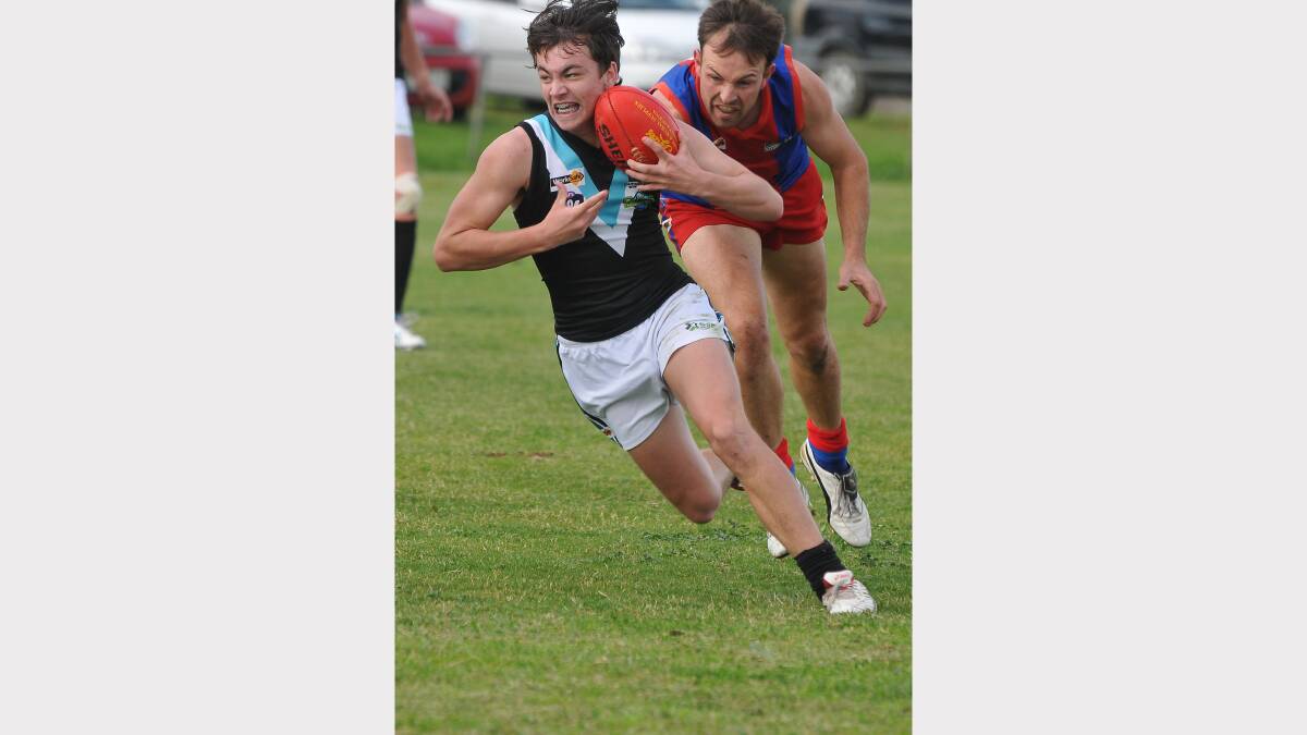 Swifts youngster Josh Newton breaks away from his Rupanyup opponent in Saturday's big win.