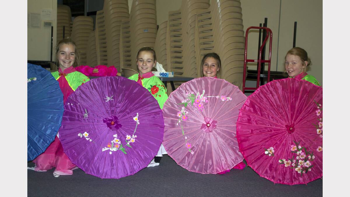 Pictured performing their traditional Chinese dance are L-R Brittany, Maeve, Darcy and Molly.