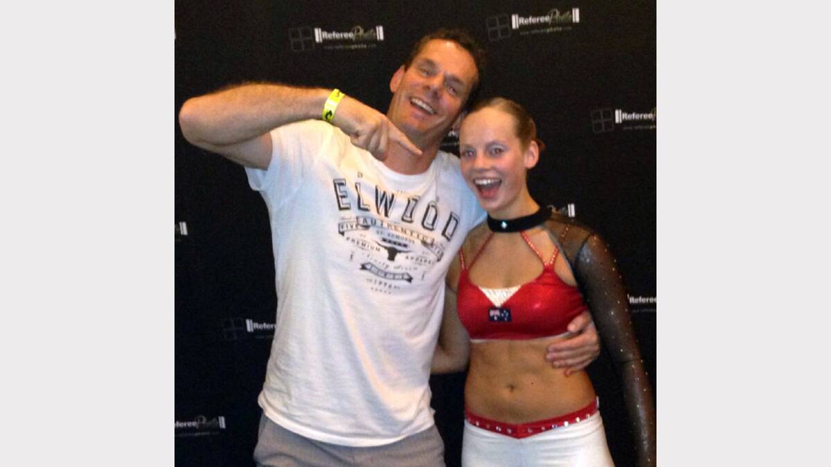 Paige Sutterby is pictured in Las Vegas with her dad Simon after winning gold in aerobic gymnastics.