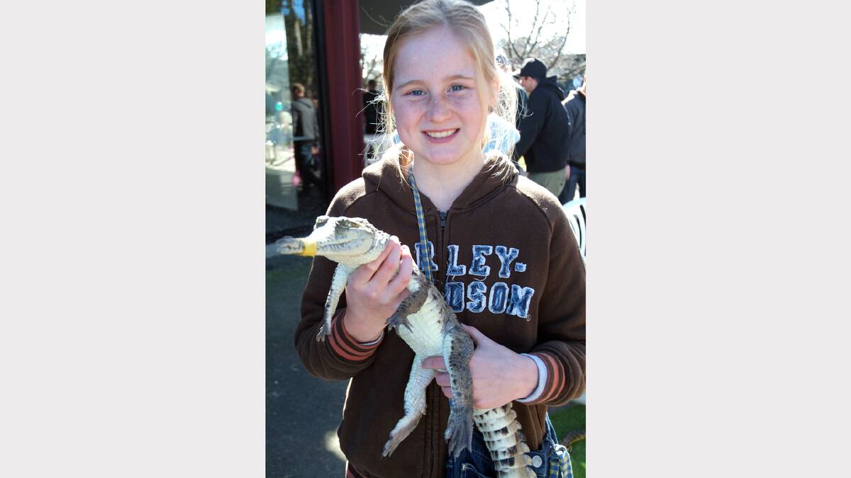 Bella, from Pomonal, is pictured with Chopper the aligator, from Jamie and Kim's Mobile Zoo.